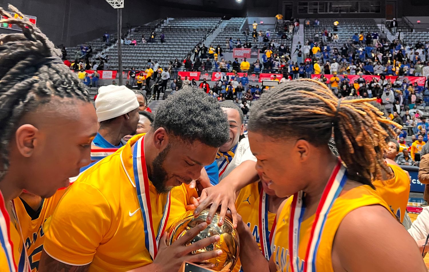 The Canton Tigers celebrate the 2024 MHSAA Class 5A State Championship after defeating Yazoo City 58-40 on March 1 at the Mississippi Coliseum.